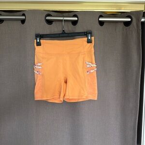 NWOT womens Fabletics bike shorts size Small.